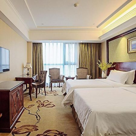 Vienna Hotel Changnan Nanchang County Bagian luar foto